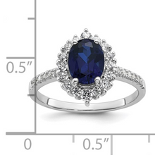Load image into Gallery viewer, Lab Created Blue Sapphire and CZ Oval Halo Ring