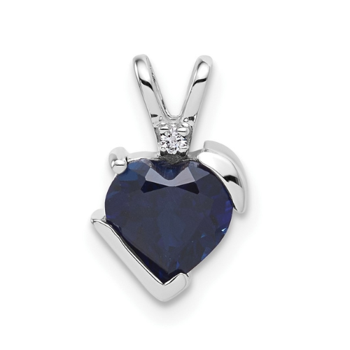 Heart-shaped blue gemstone pendant in silver setting, FCJ Jewelry LLC handcrafted jewelry