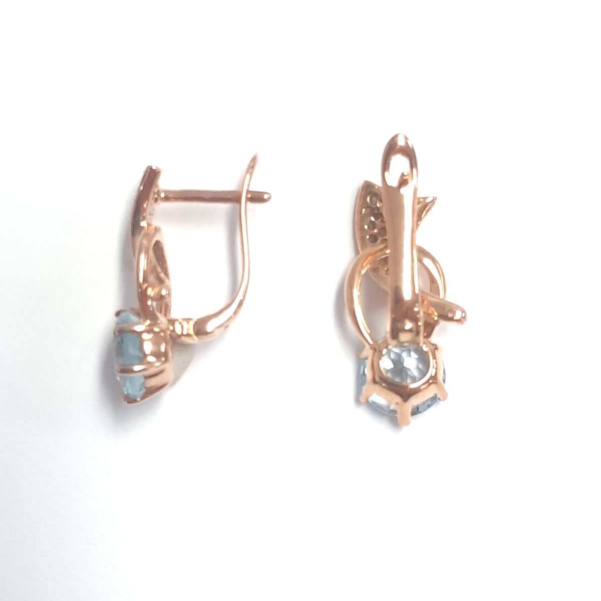 2.04 Ct Round Sky Blue Topaz Prong 14K Rose Gold Over Silver Wave Huggie Earrings