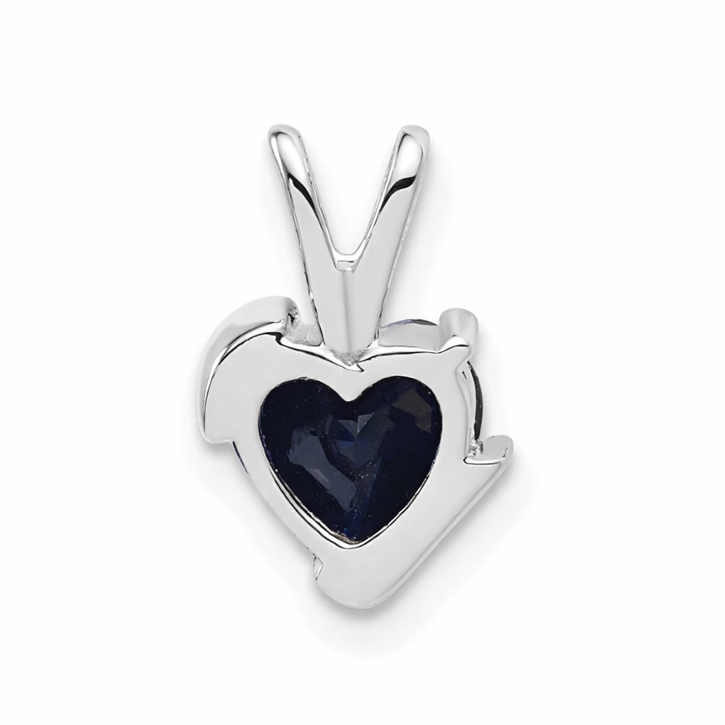 White gold heart pendant with dark blue gemstone from FCJ Jewelry LLC jewelry collection