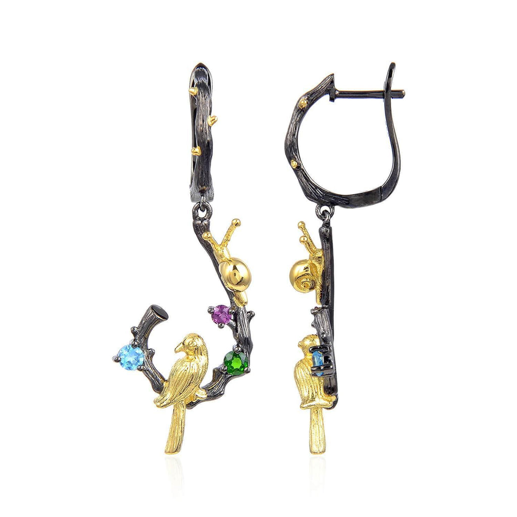 Exotic Nature Inspired Gold Plated Robin Earrings.
$ 50 - 100, Blue Topaz, Garnet, Red, Green, Blue, Round, 925 Sterling Silver, 925 Sterling Silver Ð Gold Plated Yellow, Dangle