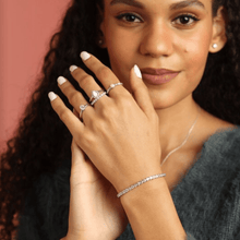 Load image into Gallery viewer, Elegant model hand showcasing the intricate details of our Tennis Bracelet Dainty Lab Grown White Sapphire Minimalist Bracelet Adjustable Gemstone Diamond Bracelet Gift for her
