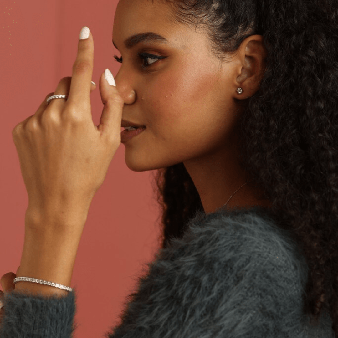 Elegant model hand showcasing the intricate details of Dainty Lab Grown White Sapphire Minimalist Bracelet