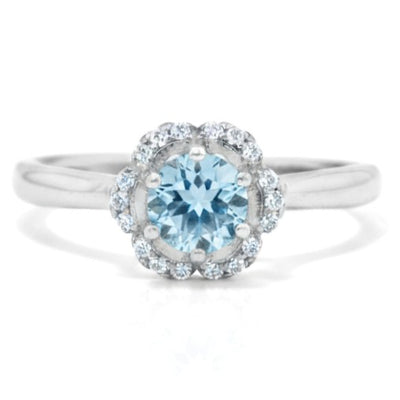 Natural Sky Blue Topaz Sterling Silver Floral Halo Ring