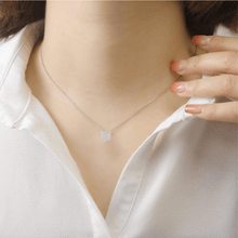 Load image into Gallery viewer, model showcasing square necklace	silver necklace	white necklace	white Topaz necklace	white topaz pendant	pendant necklace	natural white topaz	natural topaz	necklace gift	girlfriend gift	bridesmaid gift	bridesmaid necklace	bridesmaid jewelry