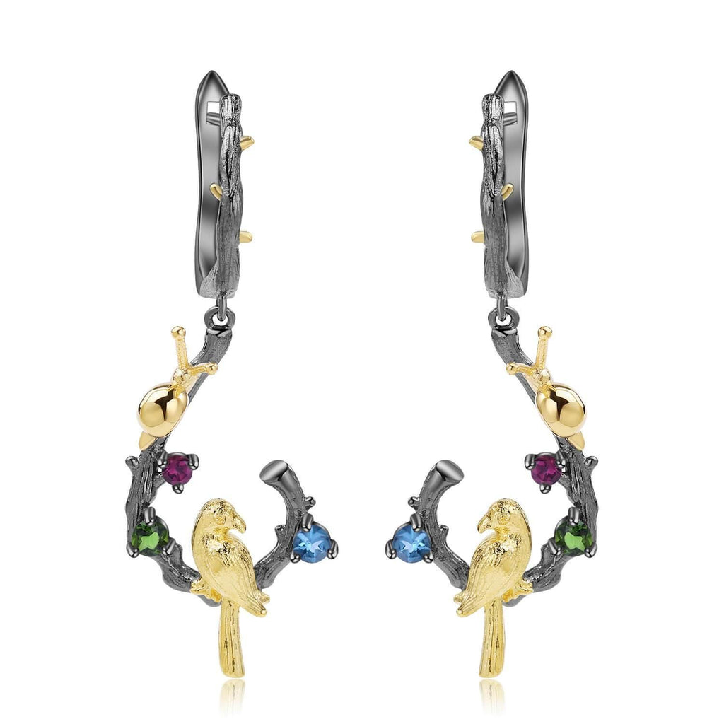 Exotic Nature Inspired Gold Plated Robin Earrings.
$ 50 - 100, Blue Topaz, Garnet, Red, Green, Blue, Round, 925 Sterling Silver, 925 Sterling Silver Ð Gold Plated Yellow, Dangle