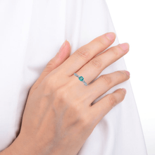 Load image into Gallery viewer, Model wearing emerald ring, model wearing green gemstone ring