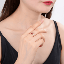 Load image into Gallery viewer, Solitaire ring on model, model wearing garnet ring, genuine garnet design