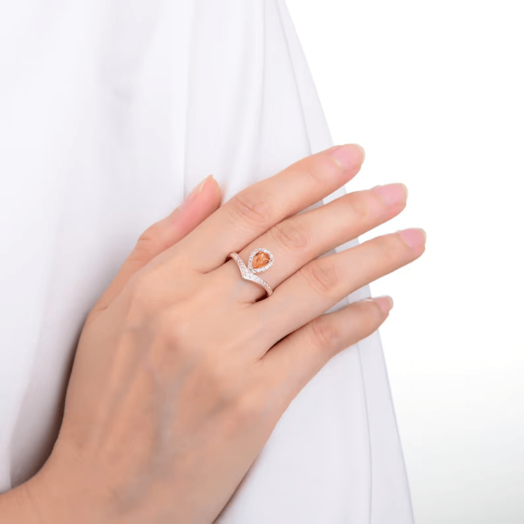 Pear shape peach sapphire ring, rings under $100, sapphire jewelry on a budget, crown inspired ring