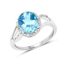 Load image into Gallery viewer, 10K White Gold Blue Topaz Halo Ring with White Diamonds