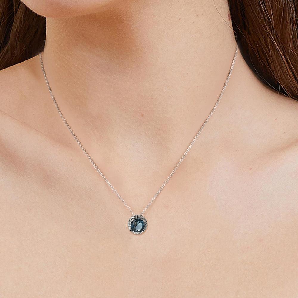 model showcasing Natural London Blue Topaz Halo Style Pendant Necklace  - FineColorJewels