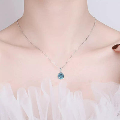 model showcasing Blue Moissanite Solitiare Necklace - FineColorJewels