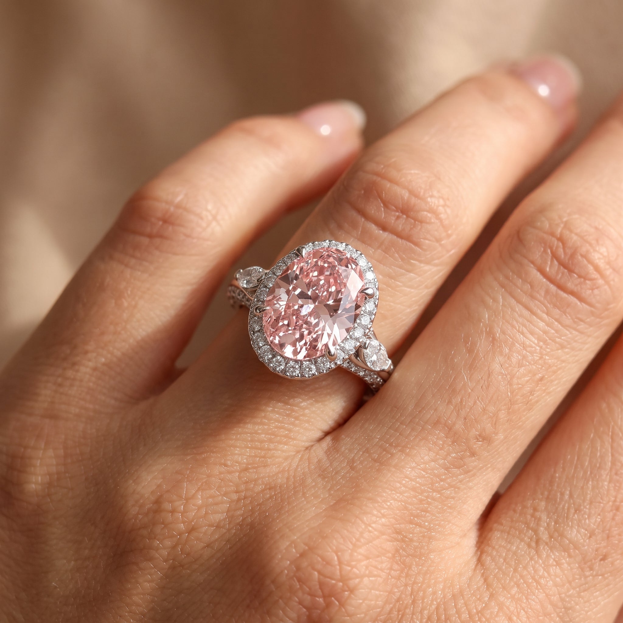 3Cttw Oval Shaped Pink Lab Grown Diamond (F/VS) Three Stone Halo Enagement Ring in 14K Gold