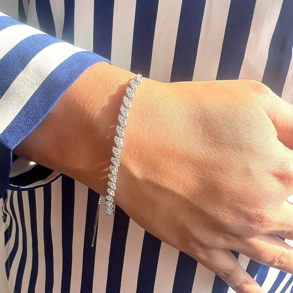 Elegant model hand showcasing the intricate details of silver bracelet,Rhodium Plated Sterling Silver Bracelet Marquise Style Bracelet Valentines Day Gifts For Wife - FineColorJewels