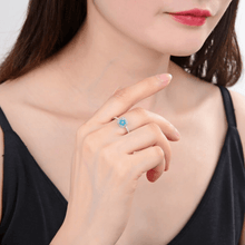 Load image into Gallery viewer, ring for her, model wearing round paraiba ring, gift for mom, natural paraiba jewelry