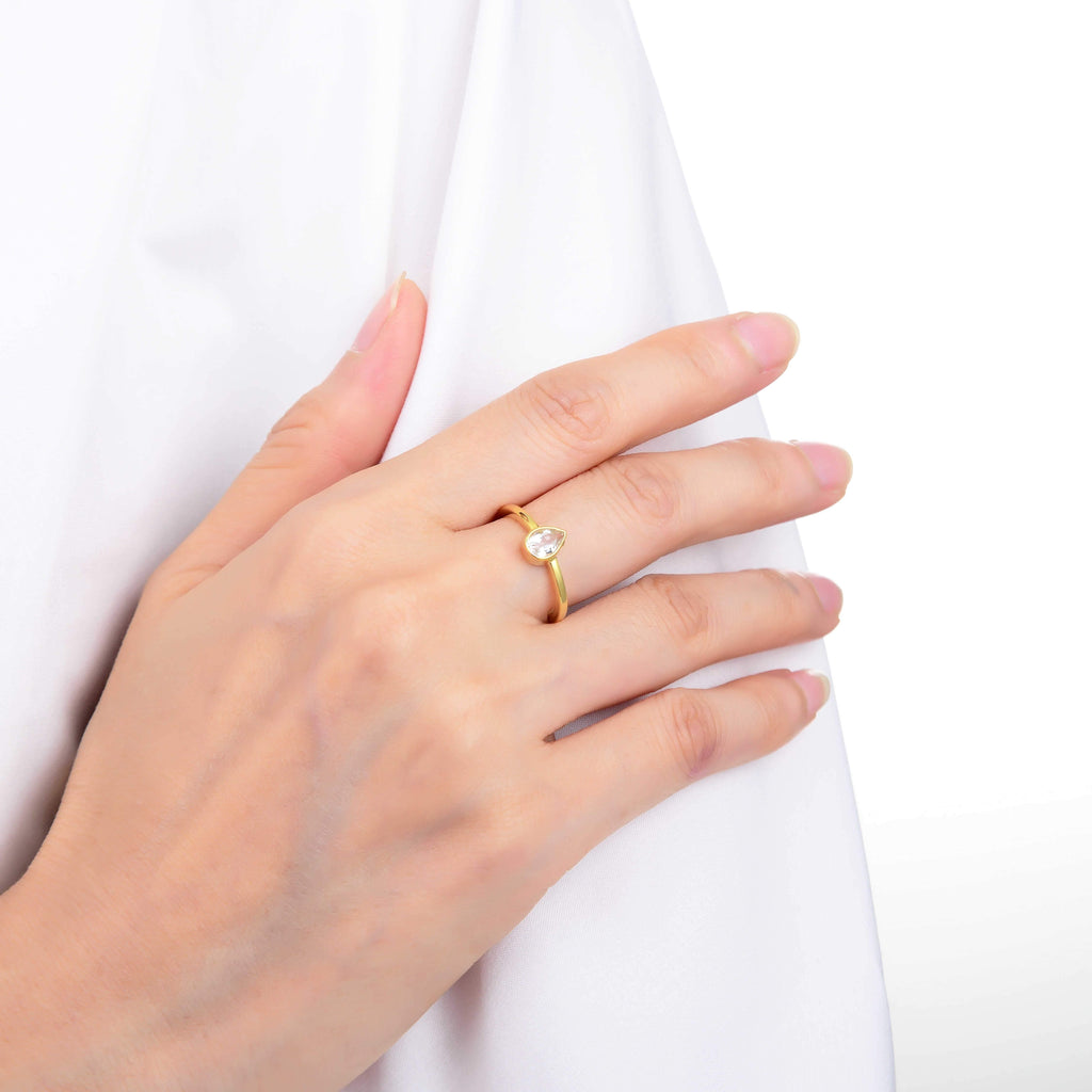 White Sapphire Pear Shaped White Topaz Solitaire Ring