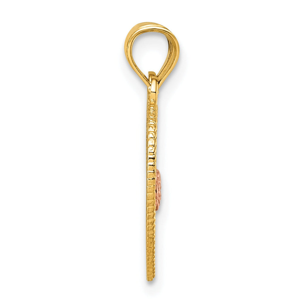 Side view of a handcrafted gold jewelry pendant with textured edge from FCJ Jewelry LLC