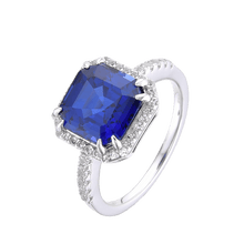 Load image into Gallery viewer, Lab Grown Asscher Cut Blue Sapphire Halo Ring with Round White Topaz Accents -September Birthstone White Rhodium-Plated 925 Sterling Silver - FineColorJewels
