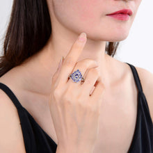 Load image into Gallery viewer, Enchanting Tanzanite Pear-Shaped Ring.
$ 100 -150, 6, 7, Round, Tanzanite, Blue Violet, White, White Topaz, 925 Sterling Silver, Statement
