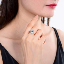 Load image into Gallery viewer, Signature Round Blue Topaz Ring .
$ 50 – 100, 6, 7, Blue, Round, Blue Topaz, White Topaz, 925 Sterling Silver, Halo
